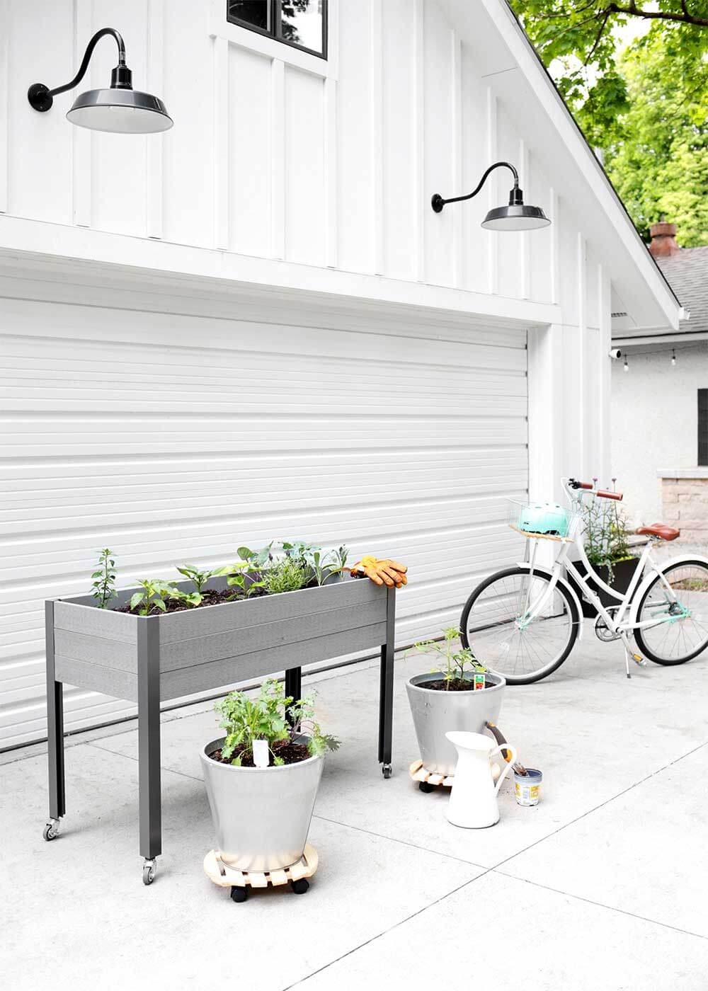 Moveable Vegetable Garden in containers from The Faux Martha