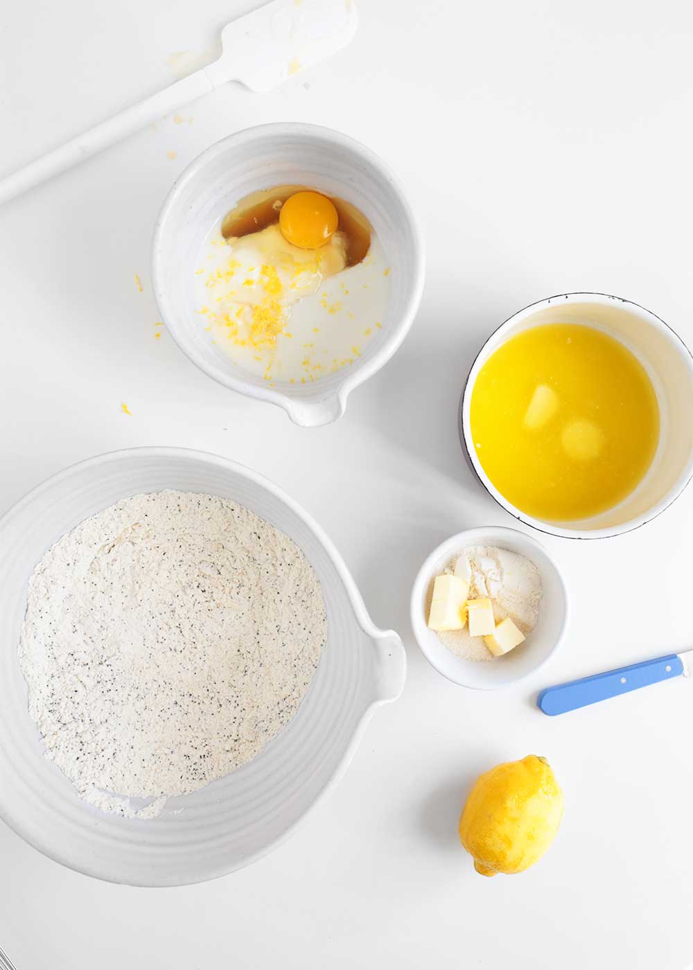 wet and dry ingredients for lemon poppy seed muffins from the faux martha
