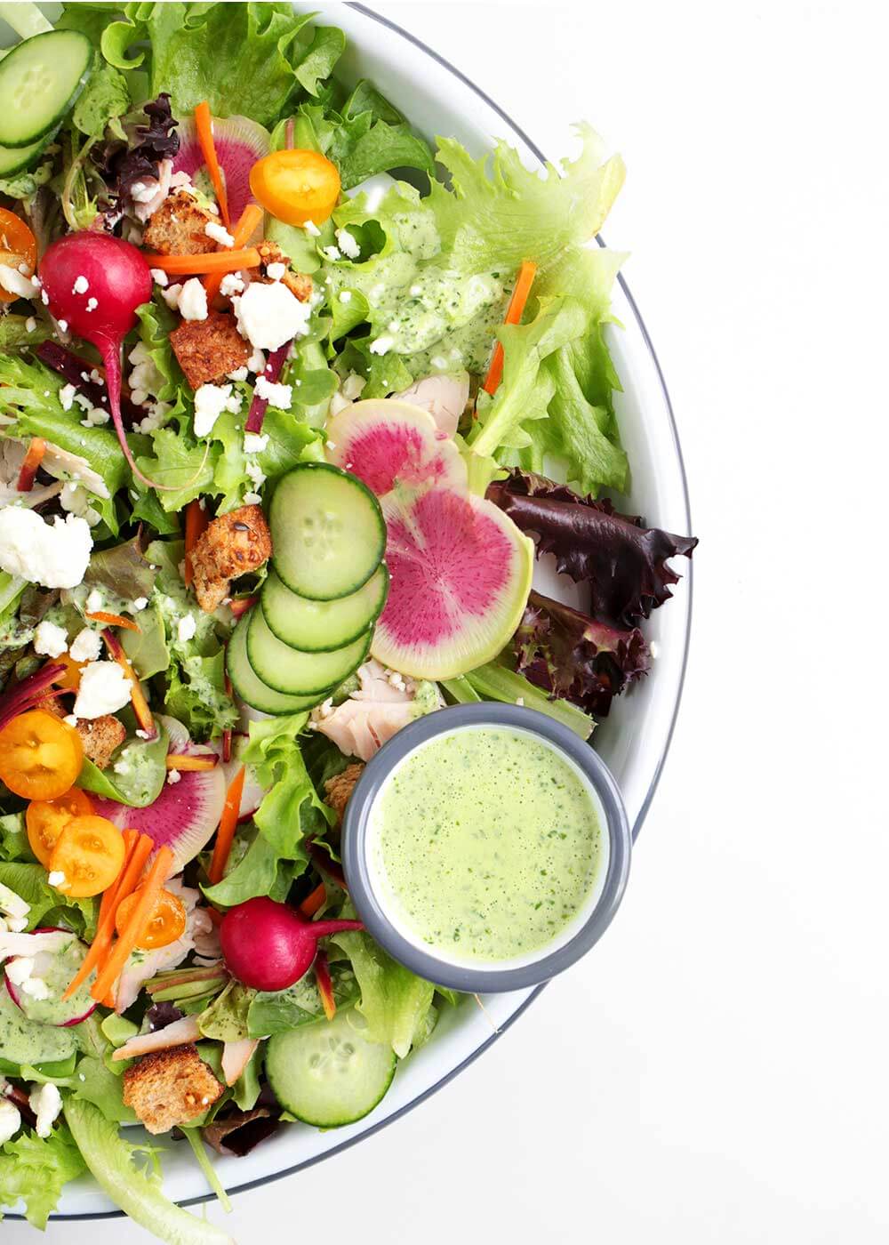 pantry friendly green goddess dressing in salad bowl from the faux martha