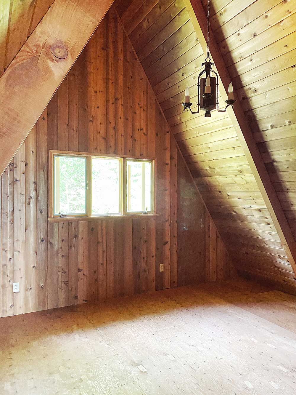 the minne stuga a-frame bedroom before