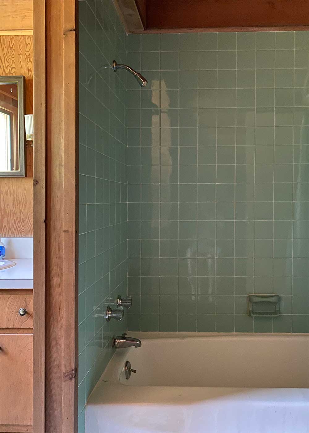 The Minne Stuga Cabin Bathroom before shower from The Faux Martha