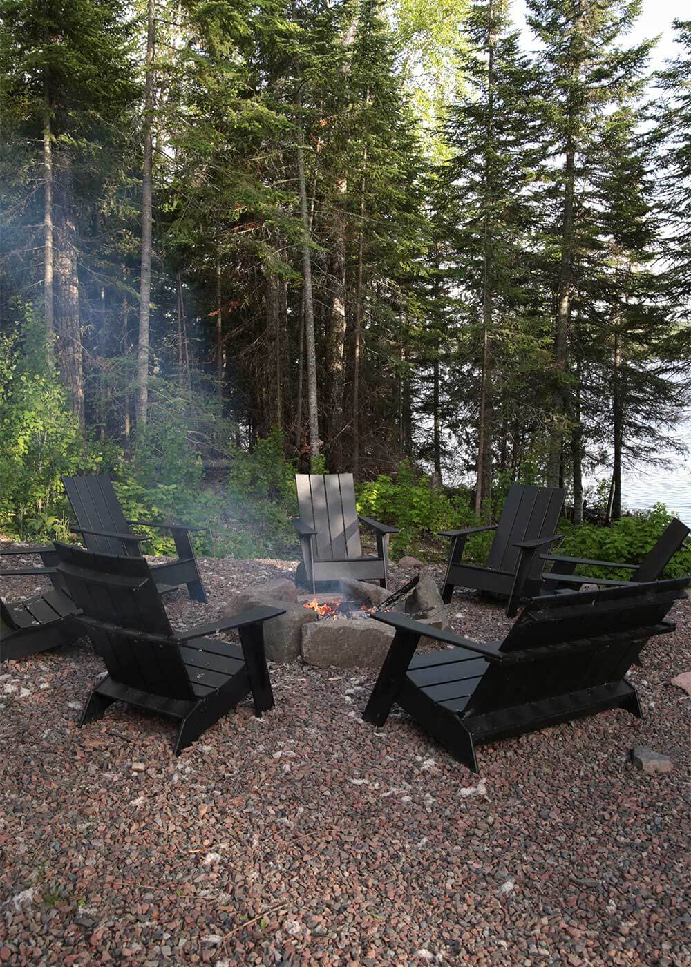 The Minne Stuga firepit with Loll Adirondack chairs and Bench